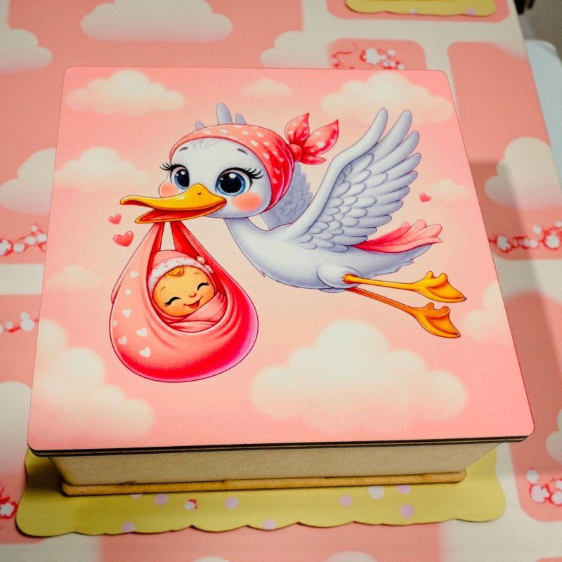 CAJA CIGÜEÑA CON BEBÉ