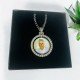 CADENA Y MEDALLA GIRATORIA CON BRILLANTES