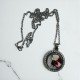 CADENA Y MEDALLA GIRATORIA CON BRILLANTES
